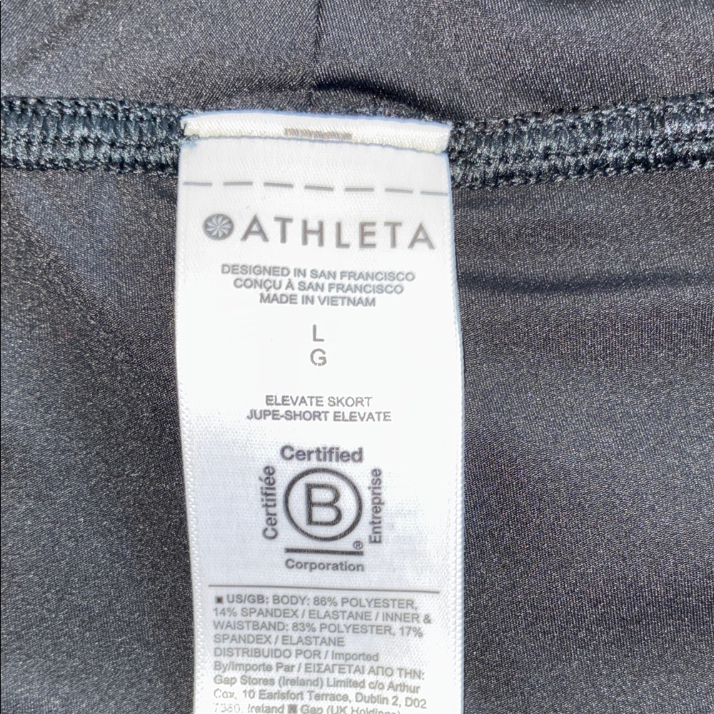 ATHLETA Black Pleated Mini Skirt with built in shorts. L - Picture 10 of 14